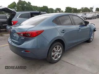 2015 Mazda 3 i SV z VIN JM1BM1T77F1251936, wystawiony jako IAAI lot #42124495 z przebiegiem 82 805 mil mil oraz . Historia ofert i sprzedaży dostępna na DreamBid. Obrazek 4.
