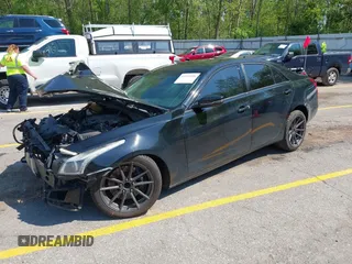 2014 Cadillac CTS Vsport RWD z VIN 1G6AU5S87E0176224, wystawiony jako IAAI lot #42273736 z przebiegiem Nie podano mil oraz . Historia ofert i sprzedaży dostępna na DreamBid. Obrazek 2.