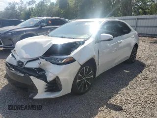 2019 Toyota Corolla L with VIN 5YFBURHE5KP921284, listed as a Copart auction lot 54277235 with 100,935 mi miles and Salvage Title. Bid and sale history available at DreamBid. Image 1.