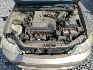 2001 Toyota Avalon XL z VIN 4T1BF28B01U175170, wystawiony jako Copart lot #58497125 z przebiegiem 99 699 mil mil oraz Tytuł czysty. Historia ofert i sprzedaży dostępna na DreamBid. Obrazek 11.