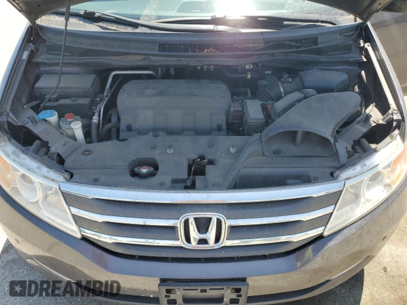2012 Honda Odyssey Touring с VIN 5FNRL5H9XCB109229, выставлен на аукционе Copart как лот 59885895 с пробегом 153 668 миль миль и Чистый • Clean title. История ставок и продаж доступна на DreamBid. Изображение 12.