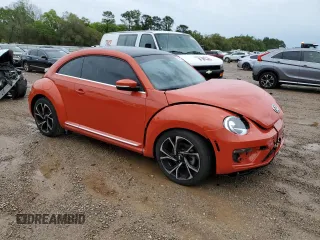 2019 Volkswagen Beetle SE with VIN 3VWJD7AT1KM705770, listed as a Copart auction lot 50811465 with 61,556 mi miles and Salvage Title. Bid and sale history available at carsss.com. Image 4.