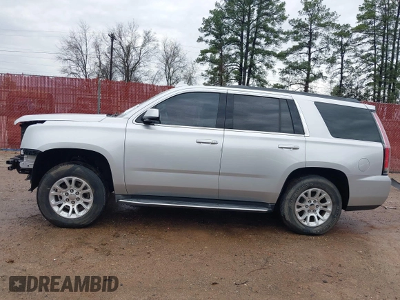 2015 GMC Yukon SLT with VIN 1GKS1BKC7FR628736, listed as a IAAI auction lot 41709926 with 130,254 mi miles. Bid and sale history available at carsss.com. Image 15.