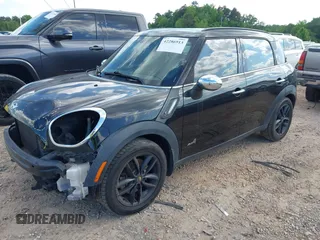 2013 MINI Countryman S ALL4 with VIN WMWZC5C57DWM15738, listed as a IAAI auction lot 42286913 with 175,299 mi miles and . Bid and sale history available at DreamBid. Image 2.