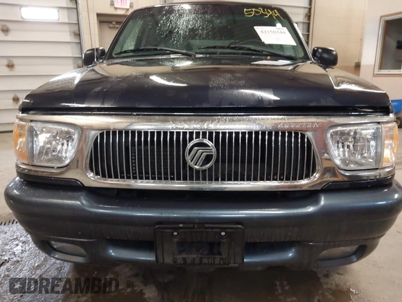 1999 Mercury Mountaineer z VIN 4M2DU55P0XUJ08169, wystawiony jako IAAI lot #42150344 z przebiegiem 164 994 mil mil oraz . Historia ofert i sprzedaży dostępna na DreamBid. Obrazek 6.