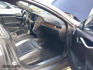 2017 Tesla Model S 100D with VIN 5YJSA1E23HF198592, listed as a IAAI auction lot 41721755 with 127,946 mi miles. Bid and sale history available at carsss.com. Image 5.