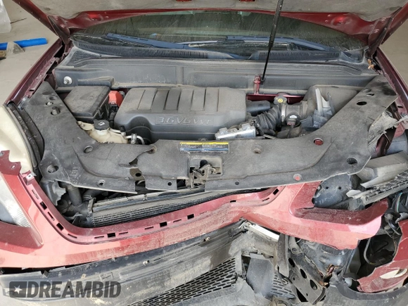 2007 GMC Acadia SLT z VIN 1GKER23737J122635, wystawiony jako Copart lot #49086355 z przebiegiem Nie podano mil oraz Szkoda całkowita • Salvage title. Historia ofert i sprzedaży dostępna na DreamBid. Obrazek 12.