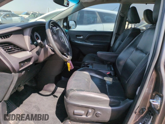 2016 Toyota Sienna SE with VIN 5TDXK3DC7GS696720, listed as a Copart auction lot 59052915 with 86,919 mi miles and Salvage title. Bid and sale history available at DreamBid. Image 7.