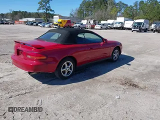 1999 Toyota Celica GT with VIN JT5FG02T2X0055844, listed as a IAAI auction lot 41770279 with 159,561 mi miles. Bid and sale history available at carsss.com. Image 4.