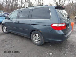 2005 Honda Odyssey EX-L with VIN 5FNRL38645B008281, listed as a IAAI auction lot 41985052 with 219,693 mi miles. Bid and sale history available at carsss.com. Image 3.