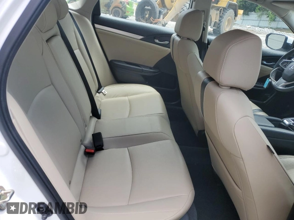 2017 Honda Civic EX-L z VIN 19XFC1F74HE014241, wystawiony jako Copart lot #59005745 z przebiegiem 55 629 mil mil oraz Czysty tytuł • Clean title. Historia ofert i sprzedaży dostępna na DreamBid. Obrazek 10.