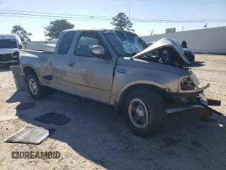 2001 Ford F-150 XL with VIN 2FTRX07L61CA37311, listed as a Copart auction lot 85752694 with 0 mi miles and Salvage Title. Bid and sale history available at carsss.com. Image 4.