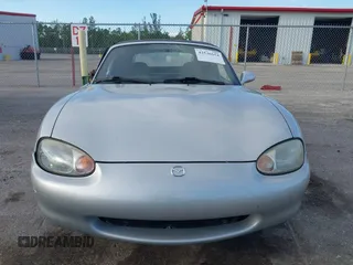1999 Mazda MX-5 Miata with VIN JM1NB3534X0124237, listed as a IAAI auction lot 42536654 with 92,696 mi miles and . Bid and sale history available at DreamBid. Image 13.