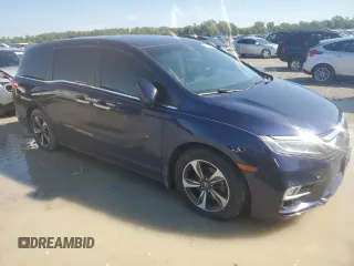 2019 Honda Odyssey Touring with VIN 5FNRL6H80KB100678, listed as a Copart auction lot 58155715 with Not provided miles and Salvage title. Bid and sale history available at DreamBid. Image 4.
