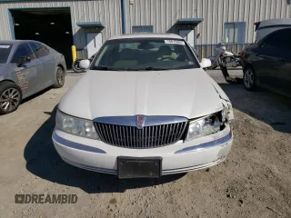 2002 Lincoln Continental with VIN 1LNHM97V62Y643532, listed as a Copart auction lot 76015984 with 154,374 mi miles and Salvage Title. Bid and sale history available at carsss.com. Image 5.