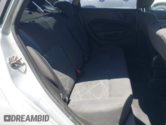 2014 Ford Fiesta S z VIN 3FADP4AJ0EM102338, wystawiony jako IAAI lot #42670979 z przebiegiem 141 301 mil mil oraz . Historia ofert i sprzedaży dostępna na DreamBid. Obrazek 8.