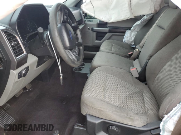2016 Ford F-150 XLT with VIN 1FTEW1EG7GKD00973, listed as a Copart auction lot 56011785 with 128,344 mi miles and Salvage title. Bid and sale history available at DreamBid. Image 7.