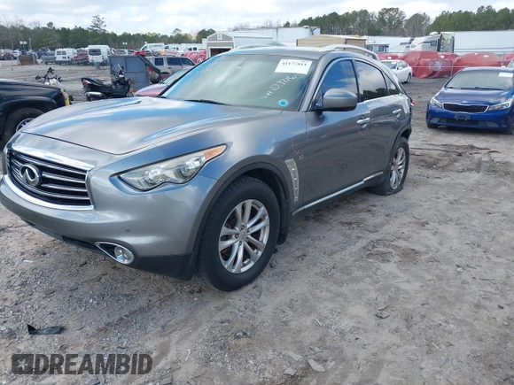 2015 Infiniti QX70 with VIN JN8CS1MWXFM480906, listed as a IAAI auction lot 41177811 with 176,527 mi miles and . Bid and sale history available at DreamBid. Image 17.