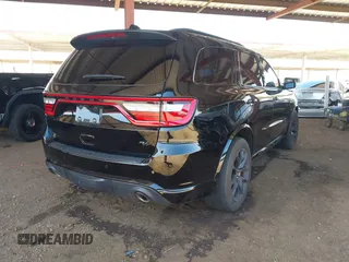 2023 Dodge Durango R/T Plus z VIN 1C4SDJCT1PC569635, wystawiony jako IAAI lot #42259684 z przebiegiem 24 148 mil mil oraz . Historia ofert i sprzedaży dostępna na DreamBid. Obrazek 4.