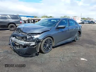 2021 Honda Civic Sport with VIN SHHFK7H40MU222581, listed as a IAAI auction lot 41451121 with 28,372 mi miles and . Bid and sale history available at DreamBid. Image 17.