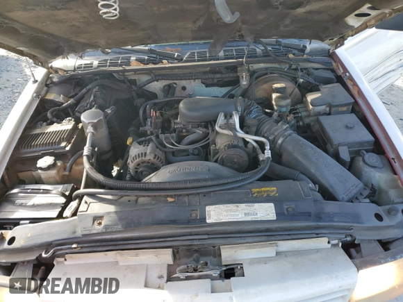 1999 Oldsmobile Bravada z VIN 1GHDT13W8X2717155, wystawiony jako Copart lot #84807244 z przebiegiem 144 805 mil mil oraz Szkoda całkowita • Salvage title. Historia ofert i sprzedaży dostępna na DreamBid. Obrazek 11.