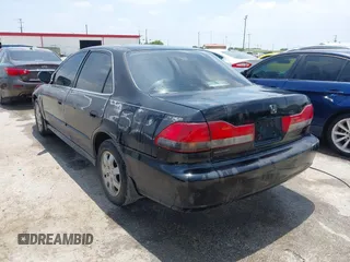 2002 Honda Accord EX z VIN 1HGCG56642A144814, wystawiony jako IAAI lot #42332217 z przebiegiem 250 835 mil mil oraz . Historia ofert i sprzedaży dostępna na DreamBid. Obrazek 3.