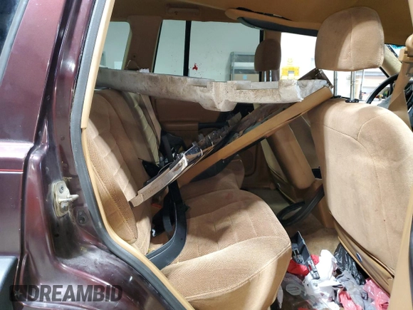 1996 Jeep Grand Cherokee Laredo with VIN 1J4GZ58Y1TC171915, listed as a Copart auction lot 50764034 with 0 mi miles and Salvage Title. Bid and sale history available at carsss.com. Image 11.