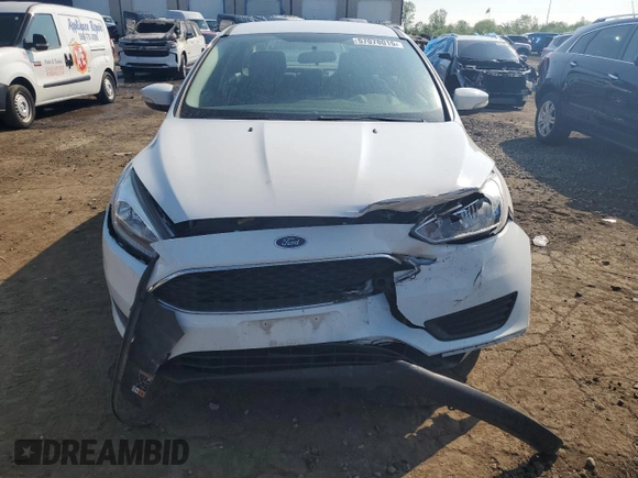 2017 Ford Focus SE with VIN 1FADP3F26HL313478, listed as a Copart auction lot 57078015 with 56,807 mi miles and Salvage title. Bid and sale history available at DreamBid. Image 5.