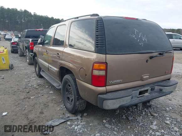2003 GMC Yukon SLT with VIN 1GKEC13T73R126739, listed as a IAAI auction lot 41361906 with 166,748 mi miles. Bid and sale history available at carsss.com. Image 3.