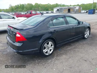 2011 Ford Fusion SPORT with VIN 3FAHP0KC6BR171723, listed as a IAAI auction lot 42072610 with 173,213 mi miles. Bid and sale history available at carsss.com. Image 4.
