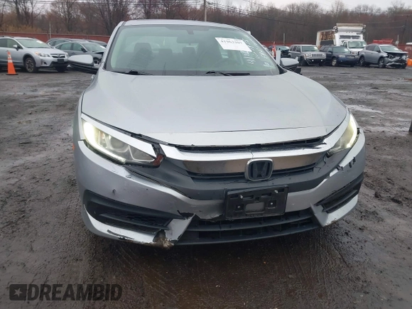2016 Honda Civic EX with VIN 19XFC2F75GE217935, listed as a IAAI auction lot 41963307 with 87,477 mi miles and . Bid and sale history available at DreamBid. Image 6.