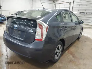 2015 Toyota Prius Four with VIN JTDKN3DU9F0479021, listed as a IAAI auction lot 42632754 with 77,400 mi miles and . Bid and sale history available at DreamBid. Image 4.