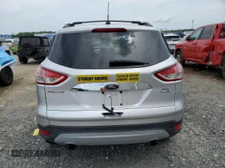 2013 Ford Escape SEL с VIN 1FMCU9H90DUD66849, выставлен на аукционе Copart как лот 58592015 с пробегом 134 998 миль миль и На запчасти • Non repairable. История ставок и продаж доступна на DreamBid. Изображение 6.