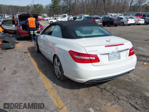 2011 Mercedes-Benz E-Class E 550 with VIN WDDKK7CF4BF093607, listed as a IAAI auction lot 41596557 with 128,548 mi miles. Bid and sale history available at carsss.com. Image 3.