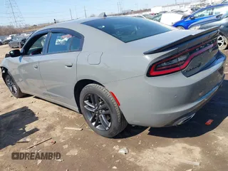 2019 Dodge Charger SXT with VIN 2C3CDXJG0KH523723, listed as a IAAI auction lot 41774826 with 110,596 mi miles and . Bid and sale history available at DreamBid. Image 3.