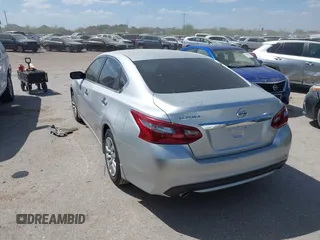 2018 Nissan Altima SV with VIN 1N4AL3AP1JC298556, listed as a IAAI auction lot 41809072 with 57,557 mi miles and . Bid and sale history available at DreamBid. Image 3.