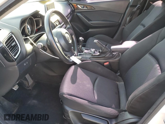 2016 Mazda 3 i Sport with VIN JM1BM1J72G1302697, listed as a Copart auction lot 42129705 with 63,022 mi miles and Salvage Title. Bid and sale history available at DreamBid. Image 7.