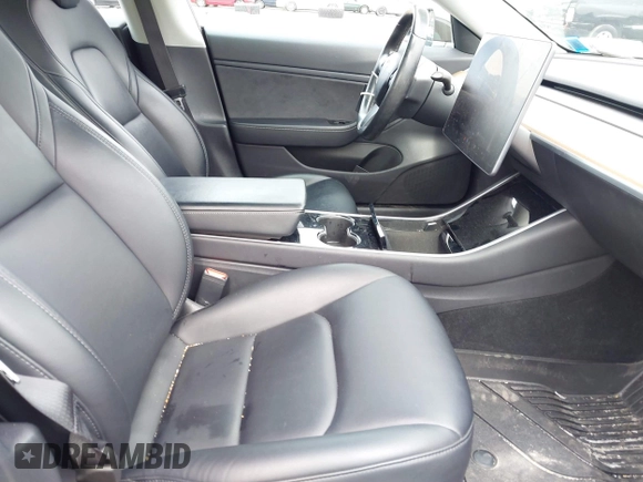 2019 Tesla Model 3 Mid Range with VIN 5YJ3E1EA2KF395549, listed as a IAAI auction lot 41895977 with 97,108 mi miles and . Bid and sale history available at carsss.com. Image 5.