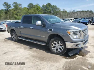 2017 Nissan Titan SL z VIN 1N6BA1F49HN514463, wystawiony jako Copart lot #51046805 z przebiegiem 99 686 mil mil oraz Szkody całkowita. Historia ofert i sprzedaży dostępna na DreamBid. Obrazek 4.