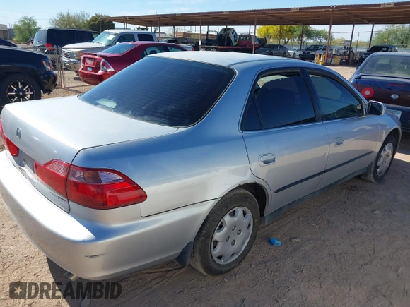 1999 Honda Accord LX z VIN JHMCG5648XC803856, wystawiony jako IAAI lot #42063037 z przebiegiem 254 421 mil mil oraz . Historia ofert i sprzedaży dostępna na DreamBid. Obrazek 4.