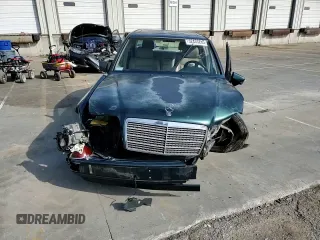 1995 Mercedes-Benz E Class with VIN WDBEA32E1SC242552, listed as a Copart auction lot 52433285 with 211,669 mi miles and Salvage Title. Bid and sale history available at carsss.com. Image 10.