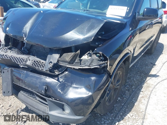 2013 Dodge Durango SXT with VIN 1C4RDJAG8DC617759, listed as a IAAI auction lot 42113300 with 185,152 mi miles and . Bid and sale history available at DreamBid. Image 19.