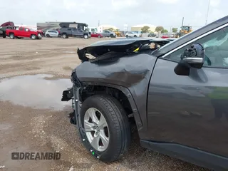 2021 Toyota RAV4 XLE with VIN 2T3W1RFV5MC104078, listed as a IAAI auction lot 42591343 with 57,057 mi miles and . Bid and sale history available at DreamBid. Image 6.