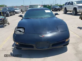 2004 Chevrolet Corvette with VIN 1G1YY22G745130585, listed as a IAAI auction lot 41981511 with 107,345 mi miles and . Bid and sale history available at DreamBid. Image 12.