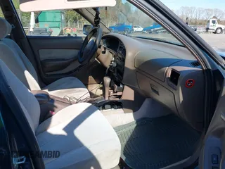 1996 Toyota Camry DX with VIN 4T1BG12K1TU688639, listed as a IAAI auction lot 41883160 with 264,542 mi miles. Bid and sale history available at carsss.com. Image 5.