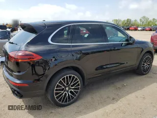 2018 Porsche Cayenne with VIN WP1AA2A27JKA04421, listed as a Copart auction lot 49601795 with 57,295 mi miles and Salvage title. Bid and sale history available at DreamBid. Image 3.
