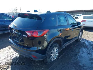 2016 Mazda CX-5 Sport with VIN JM3KE4BY0G0662294, listed as a IAAI auction lot 41469721 with 127,116 mi miles and . Bid and sale history available at carsss.com. Image 4.