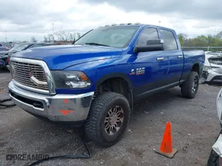 2014 Ram 2500 Tradesman with VIN 3C6UR5CL3EG302645, listed as a IAAI auction lot 41985091 with 144,384 mi miles. Bid and sale history available at carsss.com. Image 2.