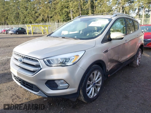 2017 Ford Escape Titanium with VIN 1FMCU0JD0HUB79739, listed as a IAAI auction lot 41807975 with 121,902 mi miles. Bid and sale history available at carsss.com. Image 17.