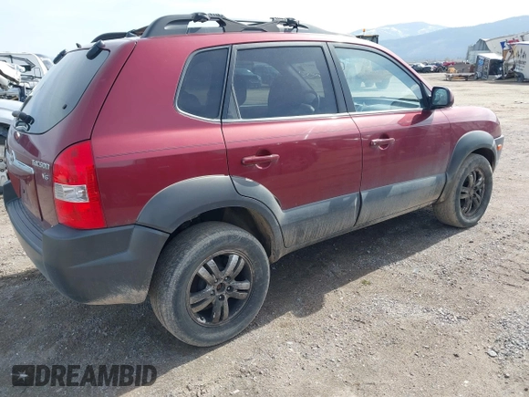 2007 Hyundai Tucson SE with VIN KM8JN72D27U615176, listed as a IAAI auction lot 41996325 with 130,396 mi miles and . Bid and sale history available at DreamBid. Image 4.